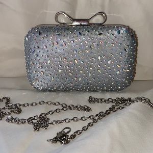Silver Clutch with rhinestone.